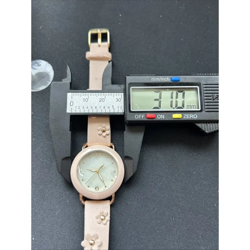 Rose Gold Case Pink Bezel And Band Women’s Quartz Watch